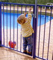 Locked gate foiling child's attempt to enter pool