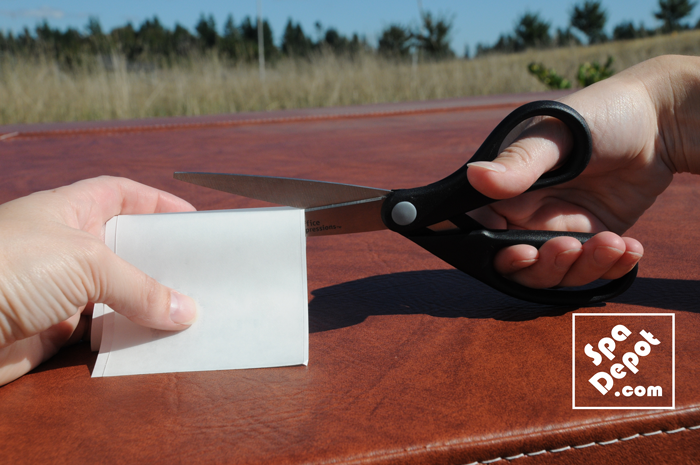 cutting patch with scissors