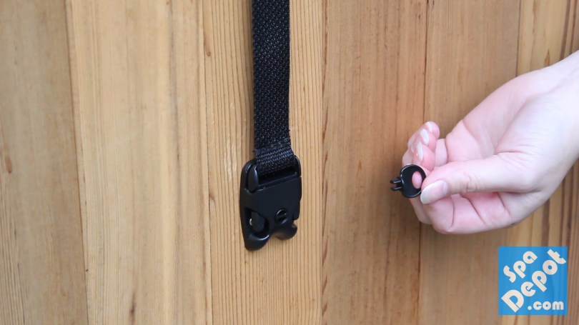 Cover strap lock key