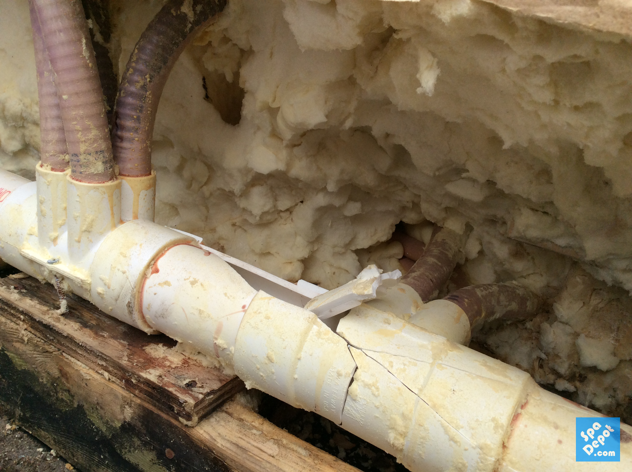 Cracked hot tub plumbing from freeze damage