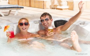 Happy hot tub couple