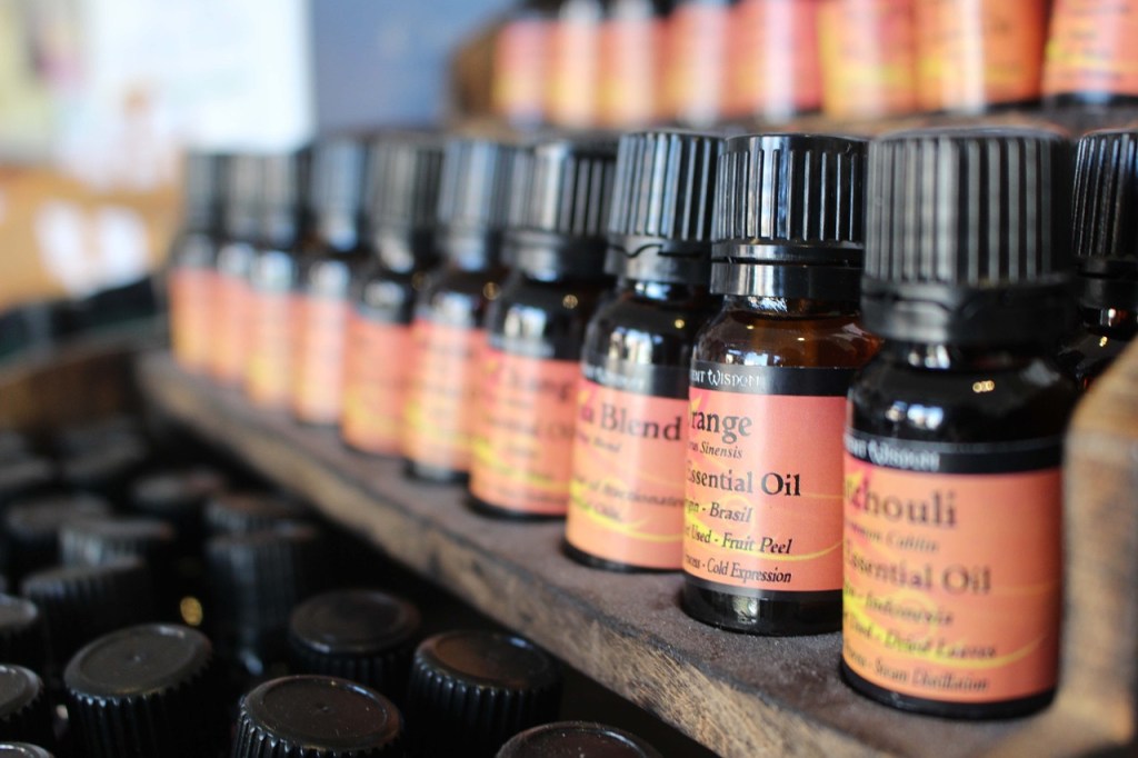 variety of essential oil ampoules on store shelf